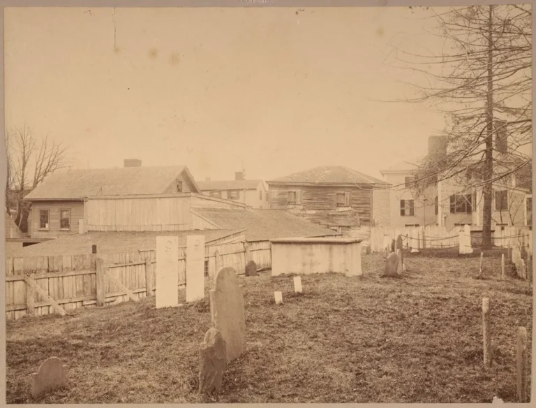 Sepia image of Charter street cemetery visually captures Salem's haunted history of a melting pot of ghosts beyond the witch trials.